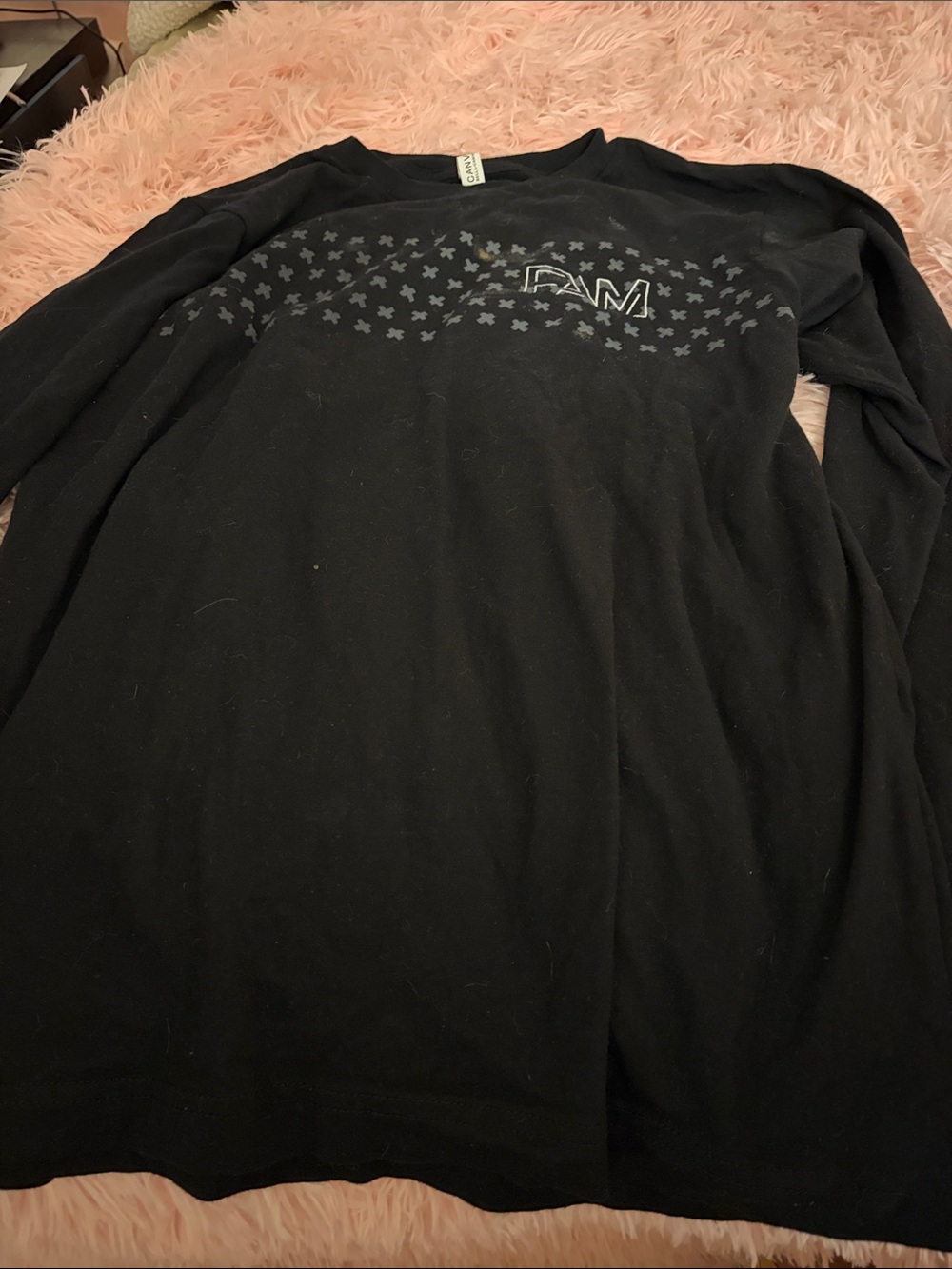 Black Long-Sleeve Crewneck Shirt with Subtle Chest Graphic